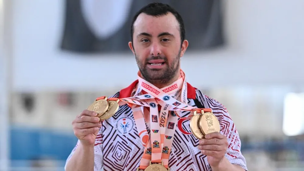 İzmirli özel sporcu Öztürk’ten tarihi başarı...İstiklal Marşı’nı yedi kez okuttu, Türkiye’nin gururu oldu